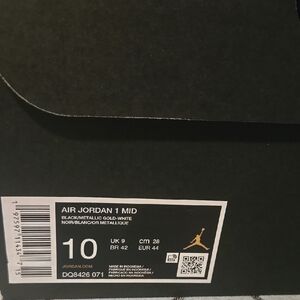 Air Jordan 1 Mid Black and Metallic Gold Sneakers